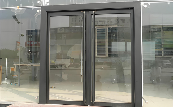 子长玻璃地弹门